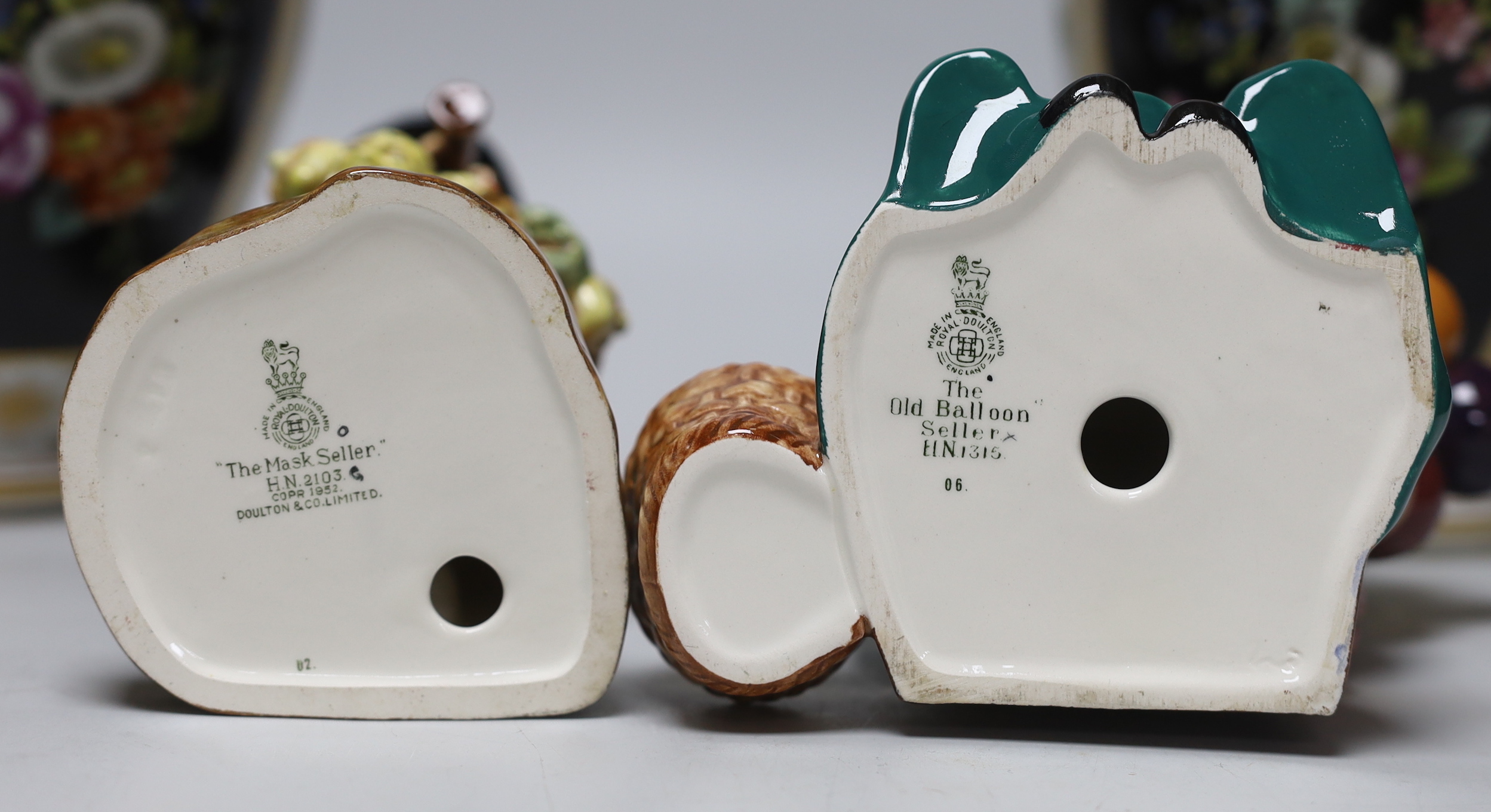 A pair of Dresden vases and covers and two Doulton figures, tallest 26cm